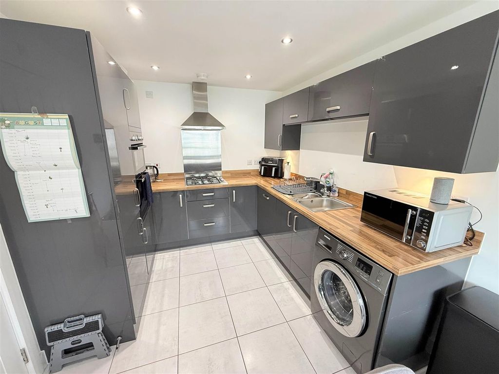 Property photo 3 of 13 Dining Kitchen