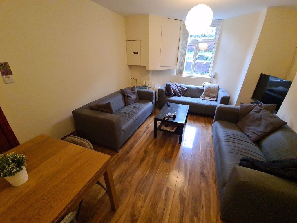 Property photo 2 of 23 Bright And Inviting Living Room With Comfortable S...