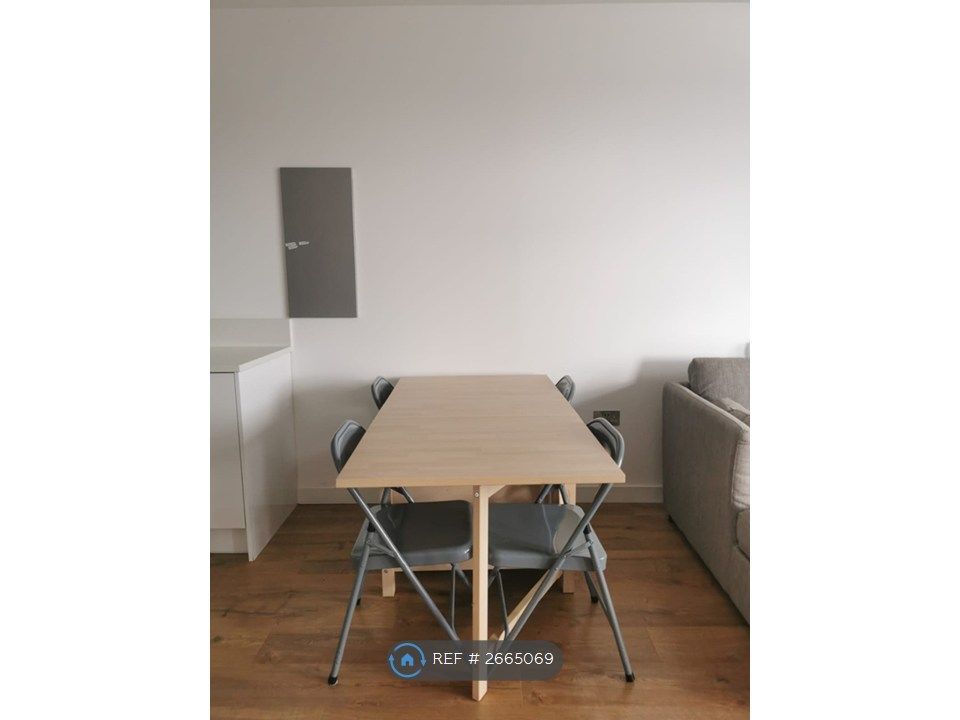 Property photo 3 of 14 Dining Table In Between The Kitchen And Living Rm