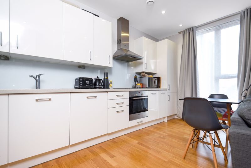 Property photo 2 of 12 Kitchen Area