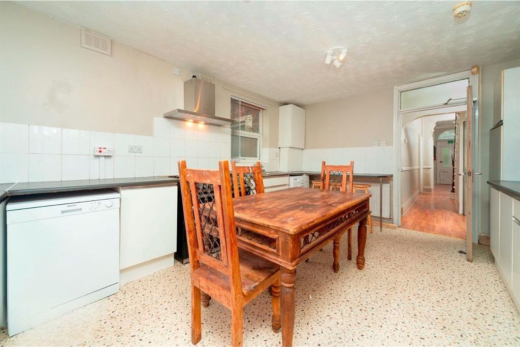 Property photo 3 of 11 Bright Kitchen With Dining Table And Fitted Units...
