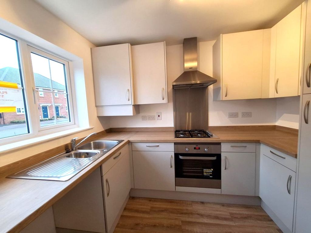 Property photo 2 of 15 Typical Kitchen
