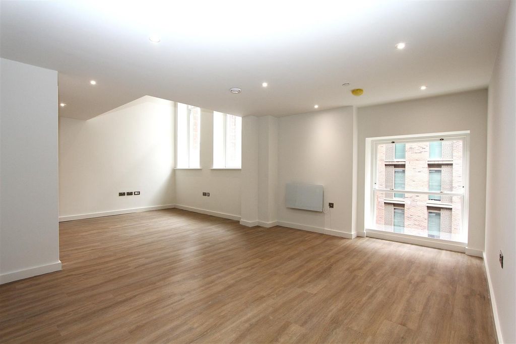 Property photo 1 of 18 Spacious Modern Living Area With Wood Flooring...