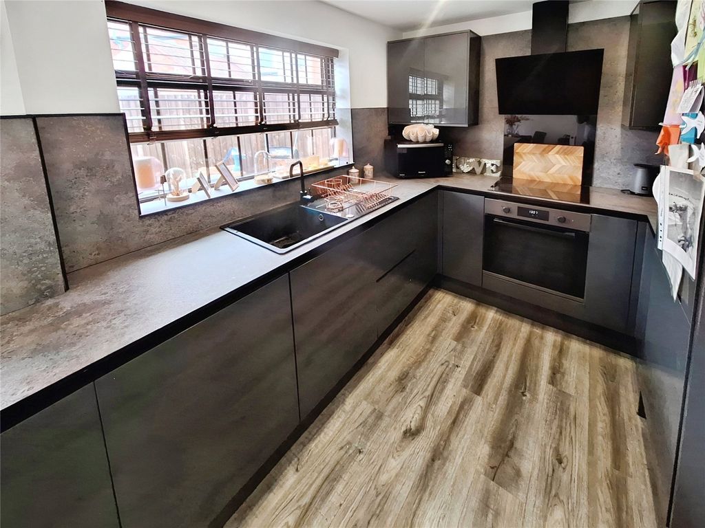 Property photo 3 of 13 Kitchen Area
