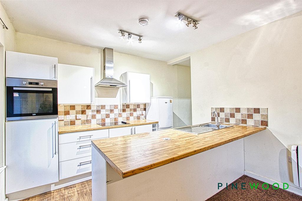 Property photo 3 of 13 Kitchen Living