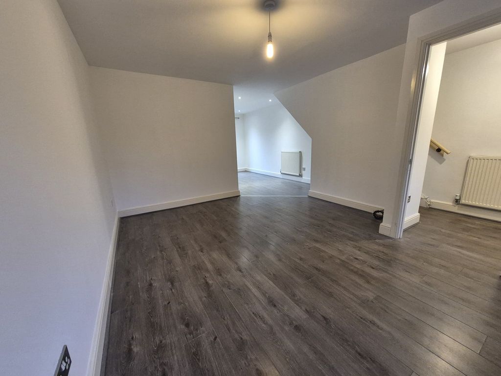 Property photo 3 of 12 Living Room 3