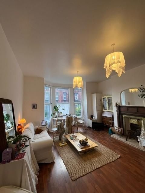 Property photo 1 of 7 Bright, Inviting Living Room With High Ceilings, B...