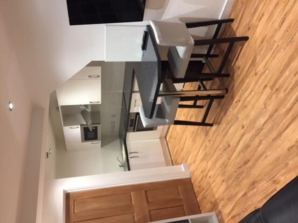 Property photo 3 of 5 A Modern Kitchenette With A Stylish Dining Area, P...