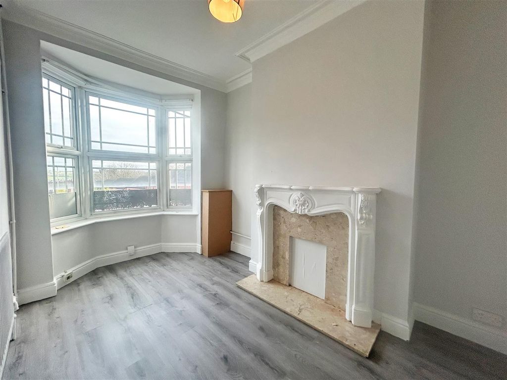 Property photo 2 of 12 Living Room