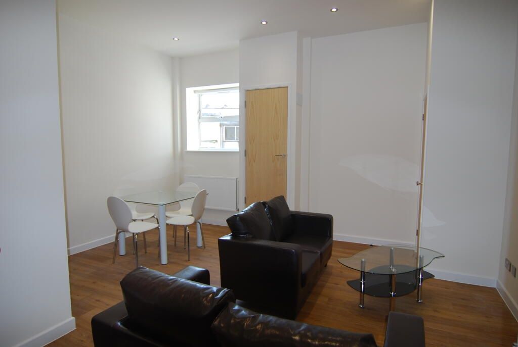 Property photo 1 of 2 A Bright And Clean Living Room Featuring Modern Bl...