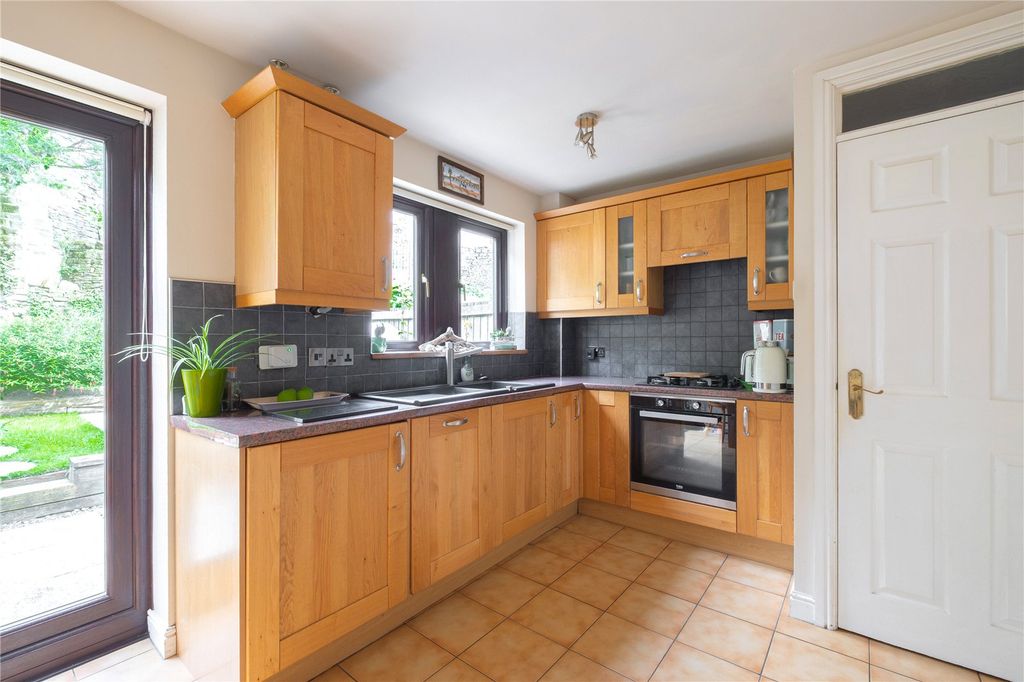 Property photo 3 of 17 Dining Kitchen