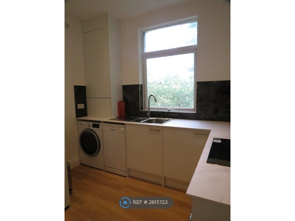 Property photo 3 of 13 Kitchen - Dishwasher And Washer-Dryer