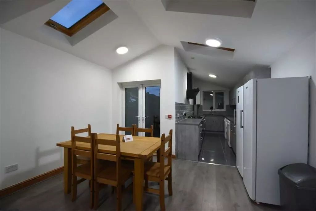 Property photo 2 of 11 Bright And Modern Kitchen With Skylights And Frenc...