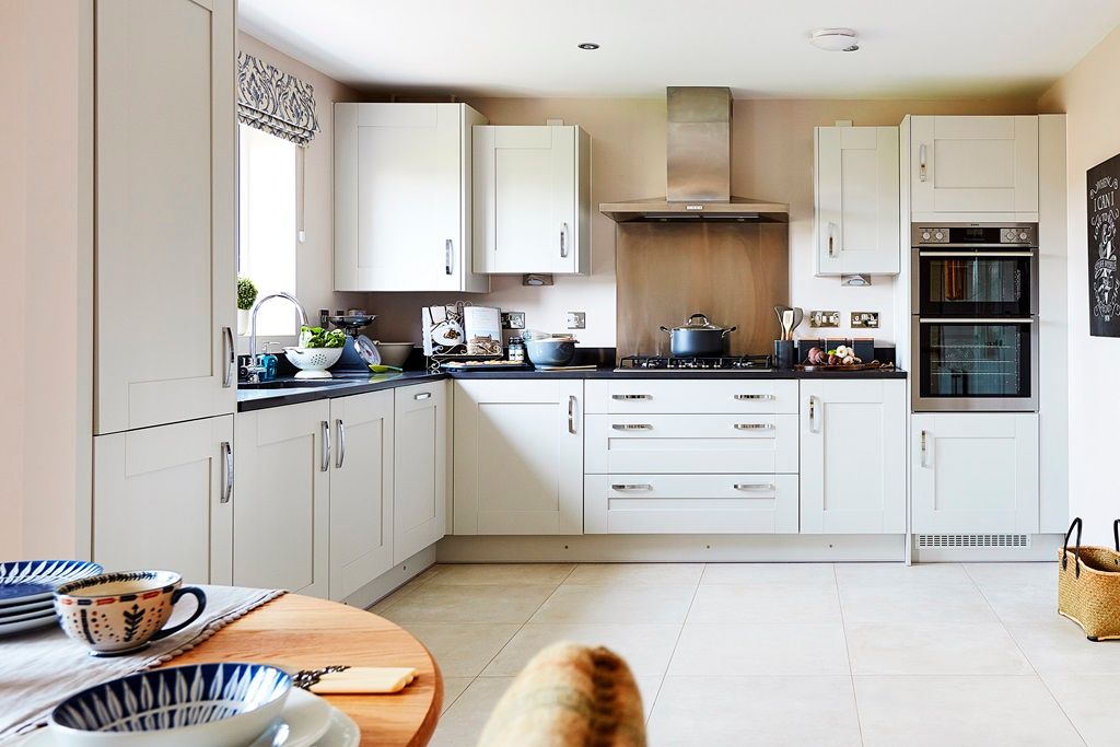 Property photo 3 of 12 Enjoy Effortless Cooking In A Sleek, Functional Kitchen