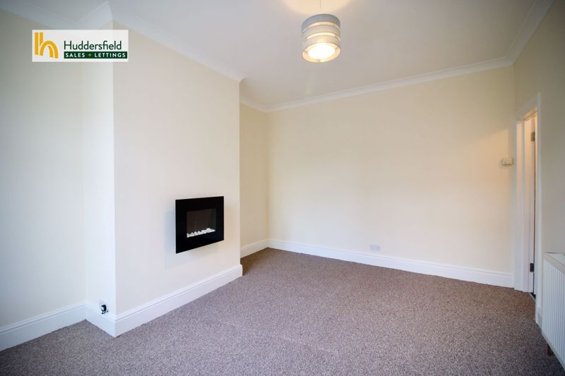 Property photo 2 of 12 Livingroom