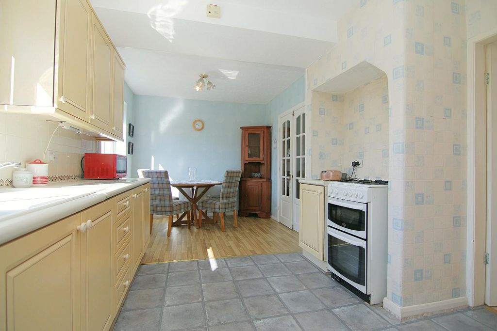 Property photo 3 of 17 Dining Kitchen