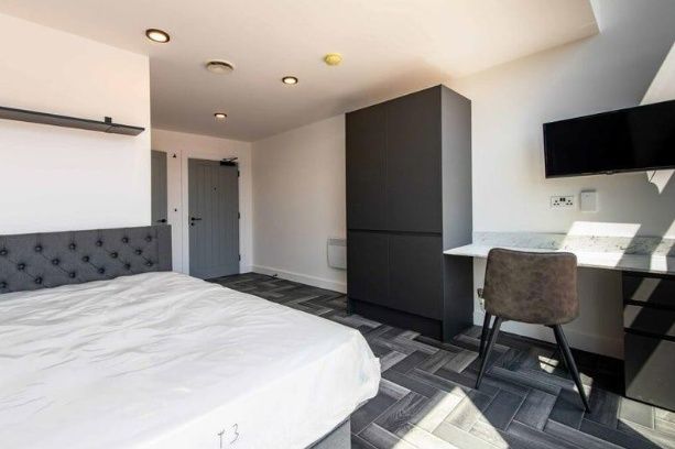 Property photo 2 of 6 Bright And Spacious Master Bedroom Featuring A Com...