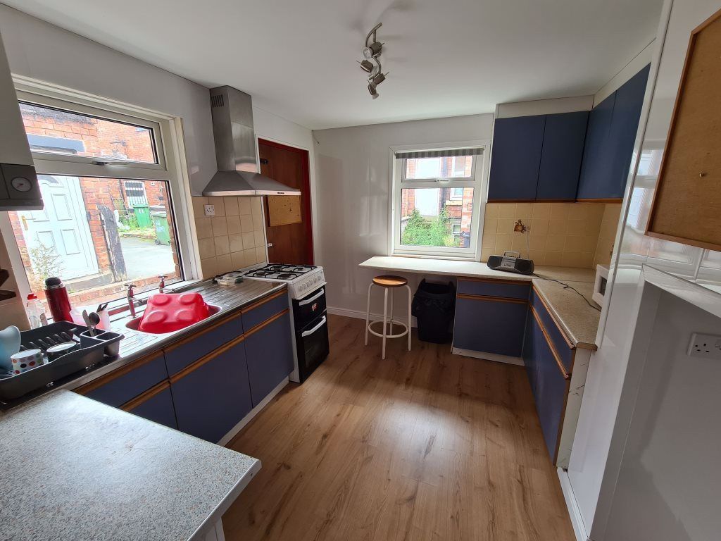 Property photo 1 of 19 Bright And Modern Kitchen Featuring Ample Countert...