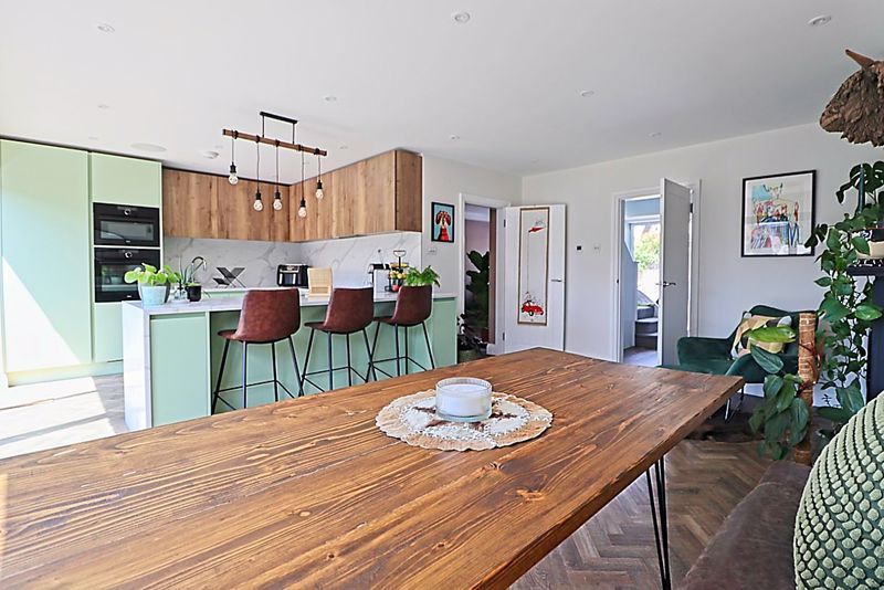 Property photo 2 of 28 Family Room Dining Kitchen