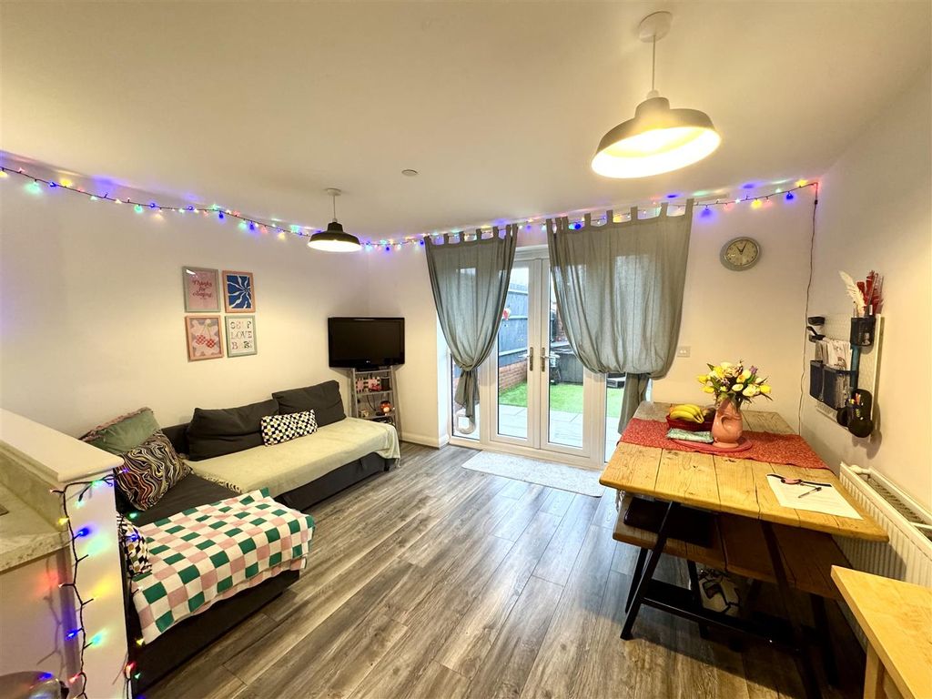 Property photo 3 of 17 Kitchen/Dining/Family Room