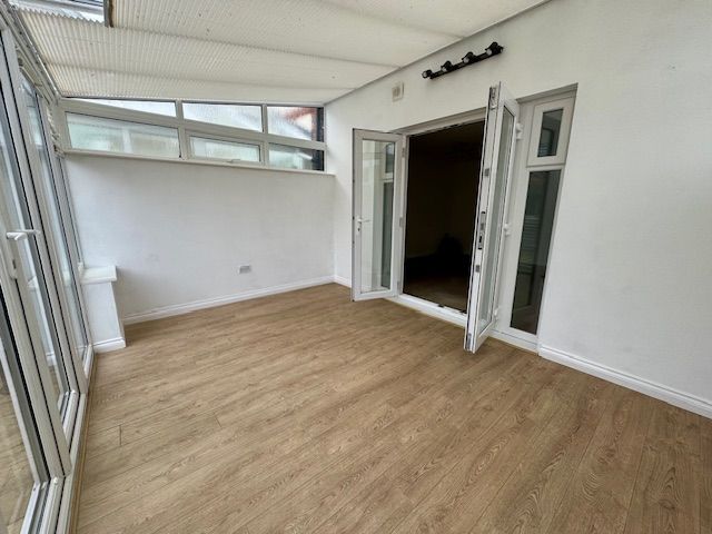 Property photo 3 of 11 Conservatory