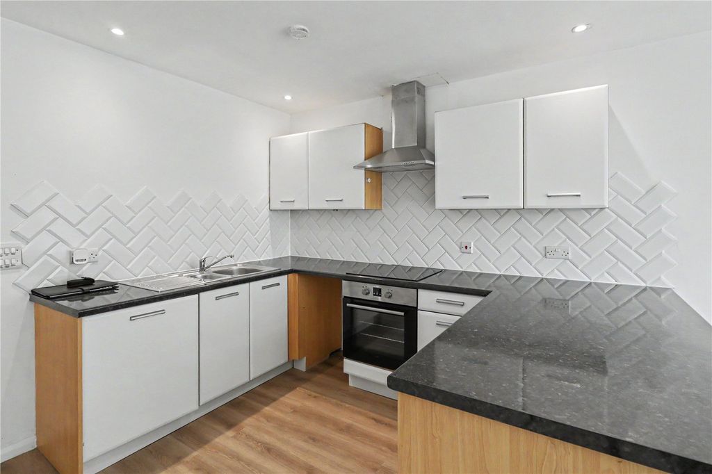 Property photo 3 of 10 Kitchen Area