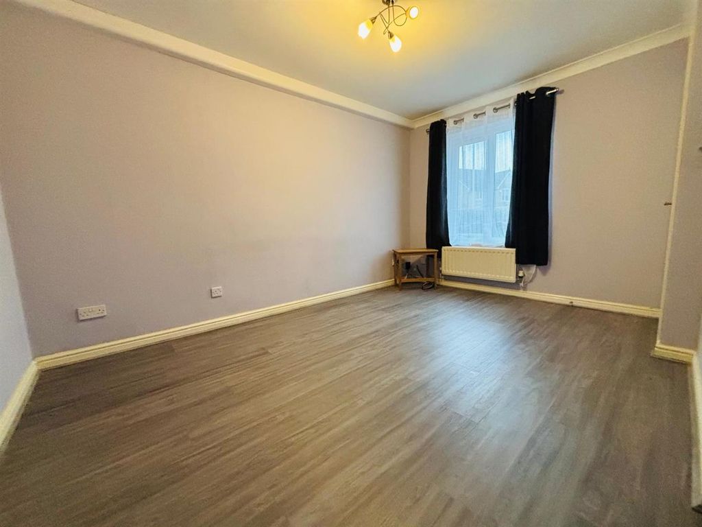 Property photo 2 of 12 Living Room: