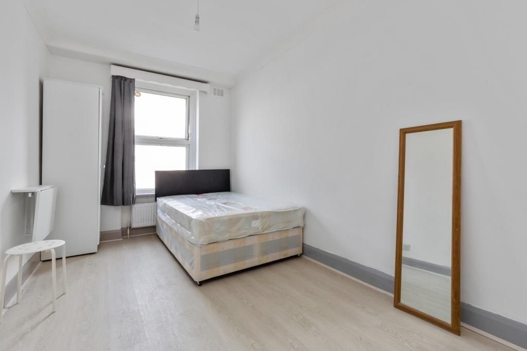 Property photo 1 of 2 Bright, Simply Furnished Bedroom With A Double Bed...