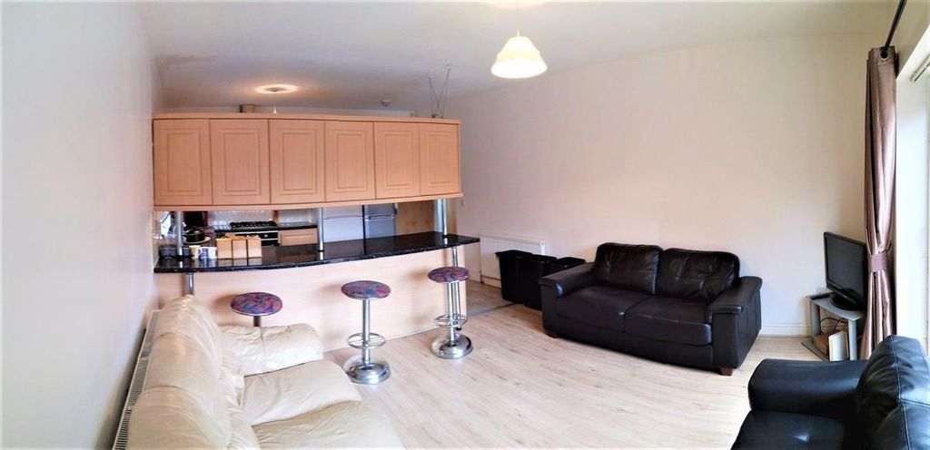 Property photo 1 of 15 A Modern Living Room Featuring A Spacious Layout W...