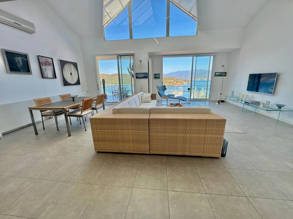 Property photo 3 of 25 Sea-View Property For Sale In Fethiye - Living Area With A Huge Skylight Offering Sea And Nature Views