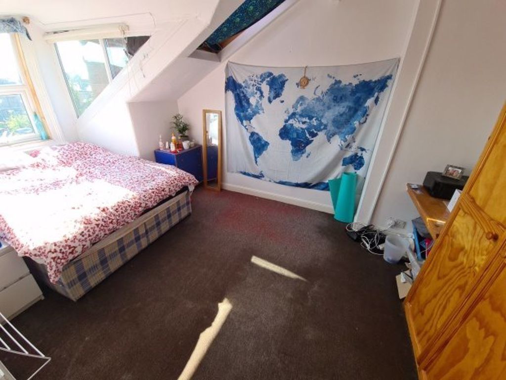 Property photo 2 of 26 A Bright And Inviting Master Bedroom Featuring A c...