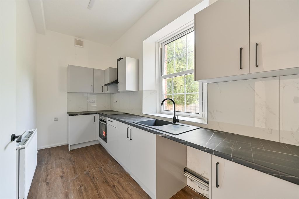 Property photo 2 of 8 Kitchen