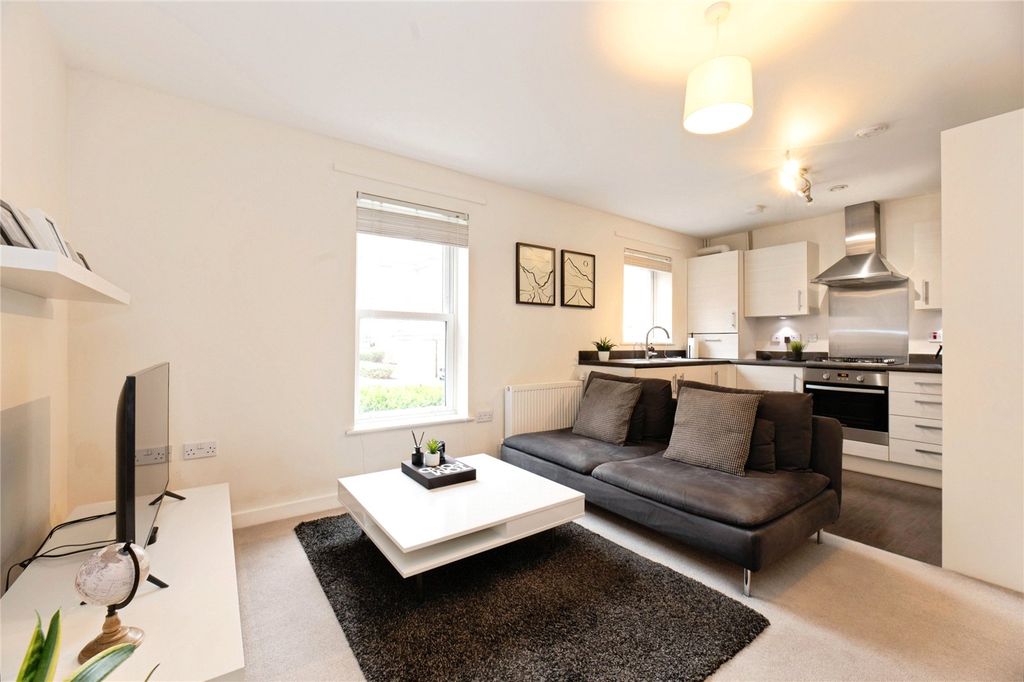 Property photo 3 of 8 Kitchen Living