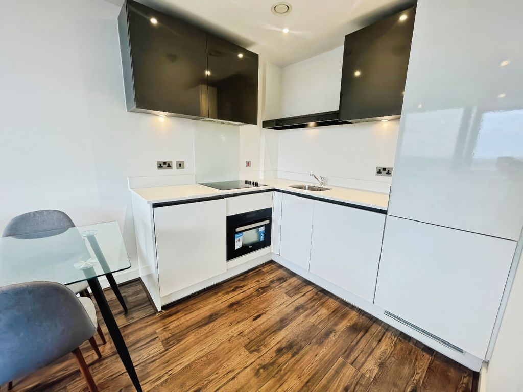 Property photo 3 of 8 Kitchen Area