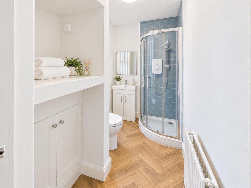 Property photo 3 of 5 White, Blue, And Oak Shower Room.Png