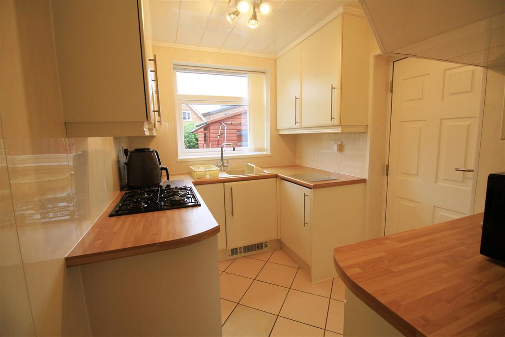 Property photo 3 of 12 Kitchen.Jpg