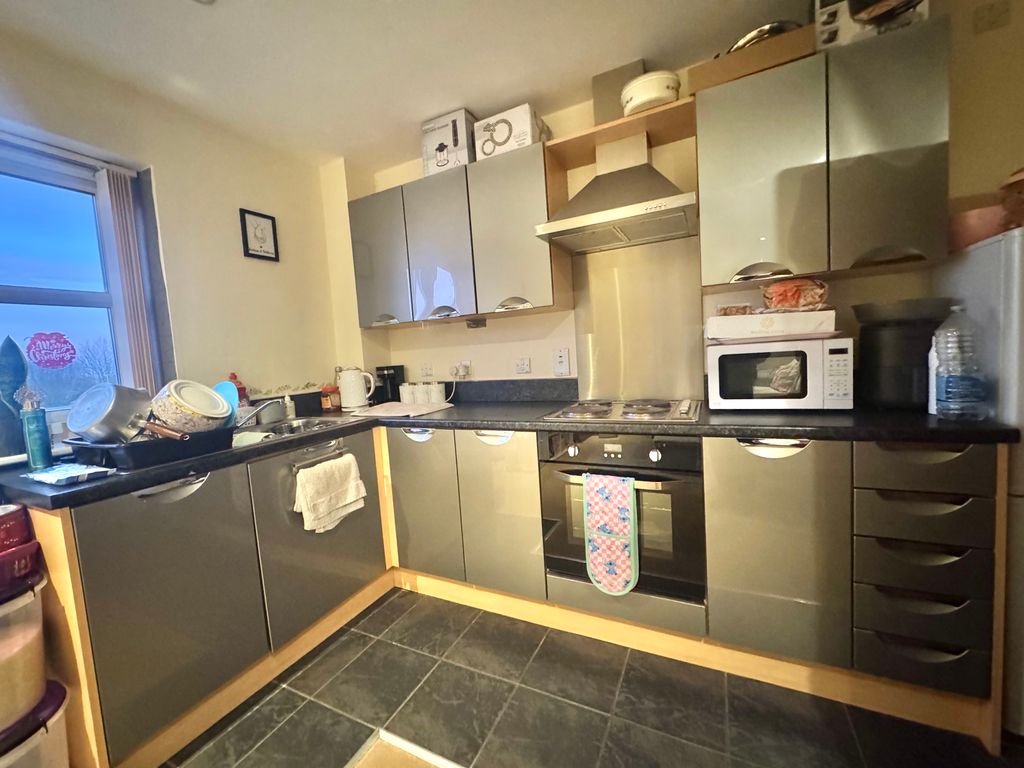 Property photo 3 of 7 Kitchen