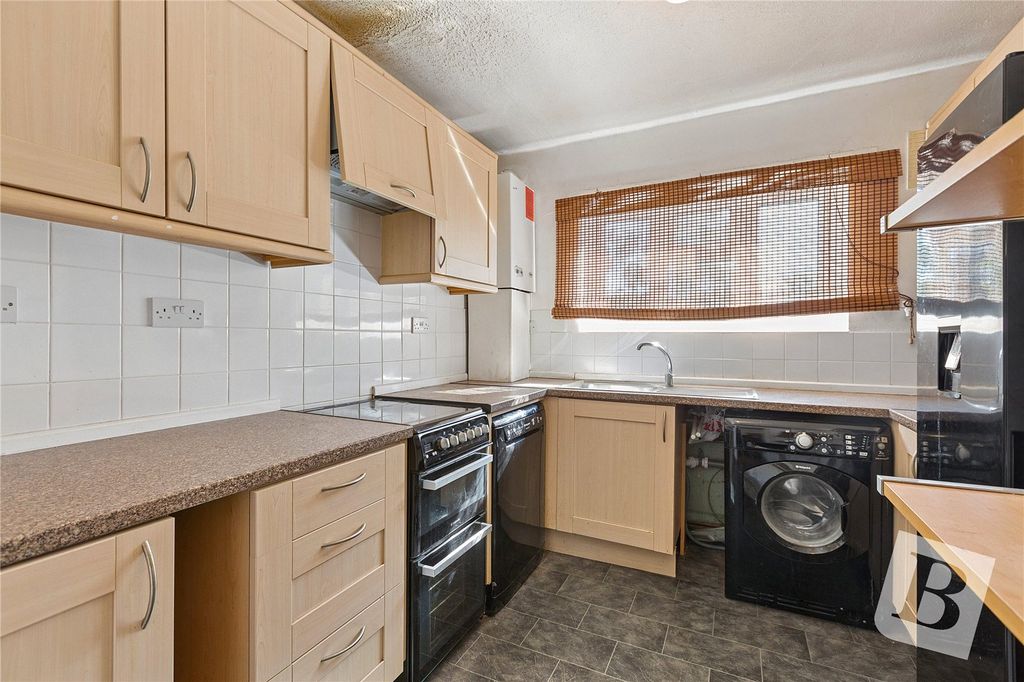 Property photo 3 of 12 Kitchen