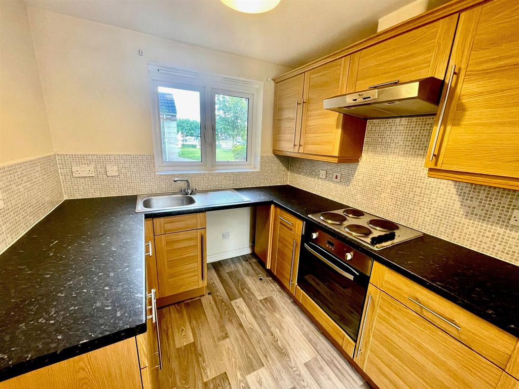 Property photo 2 of 11 Kitchen