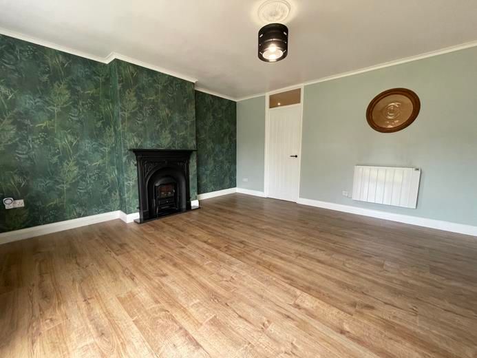 Property photo 3 of 12 Living Room