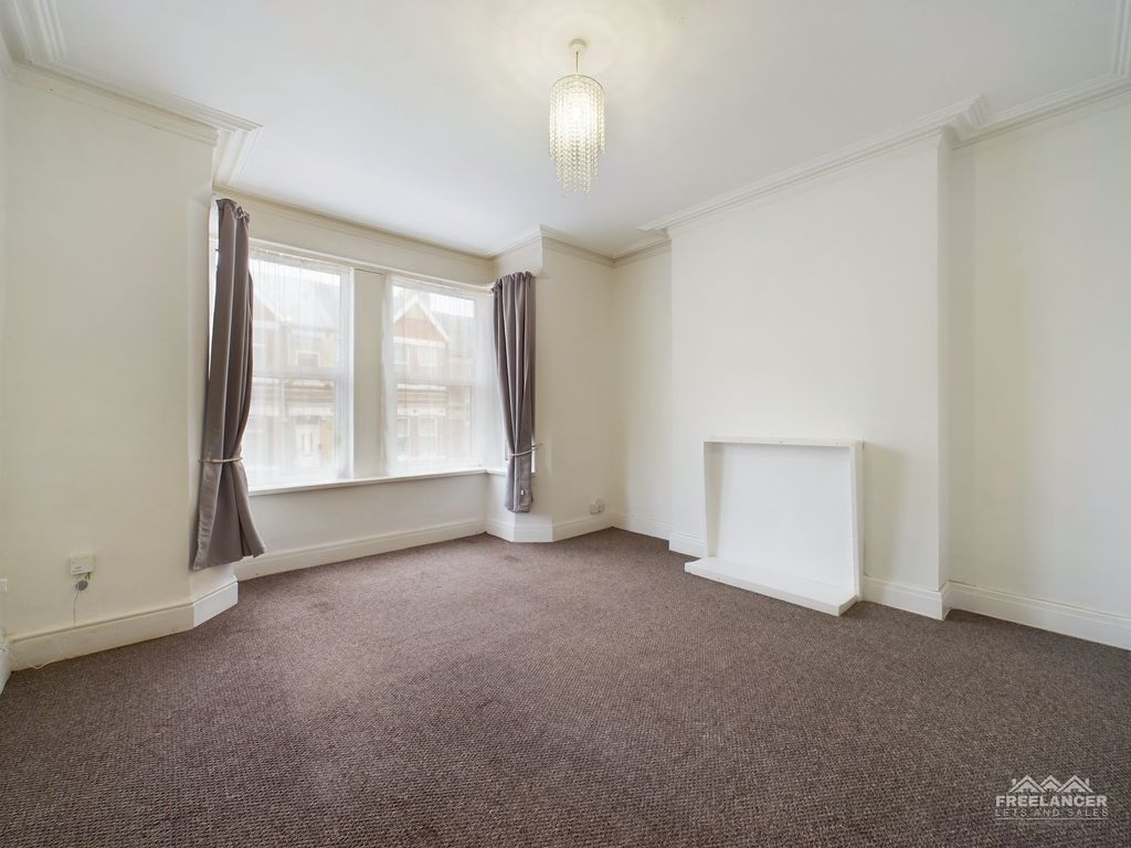 Property photo 3 of 12 Living Room