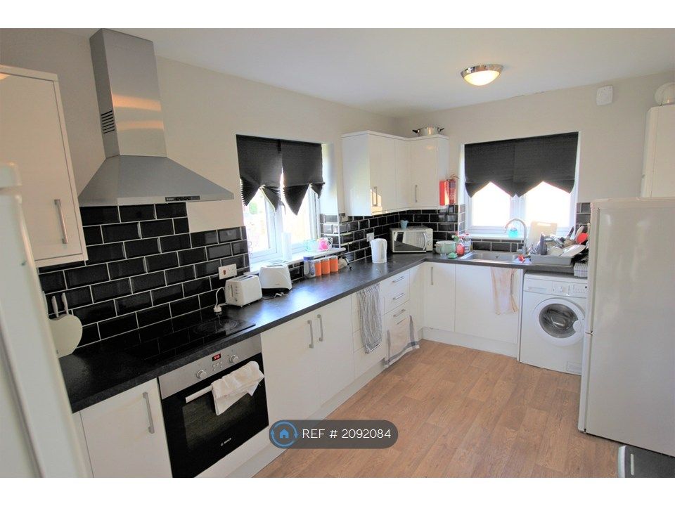 Property photo 3 of 8 Spacious Kitchen