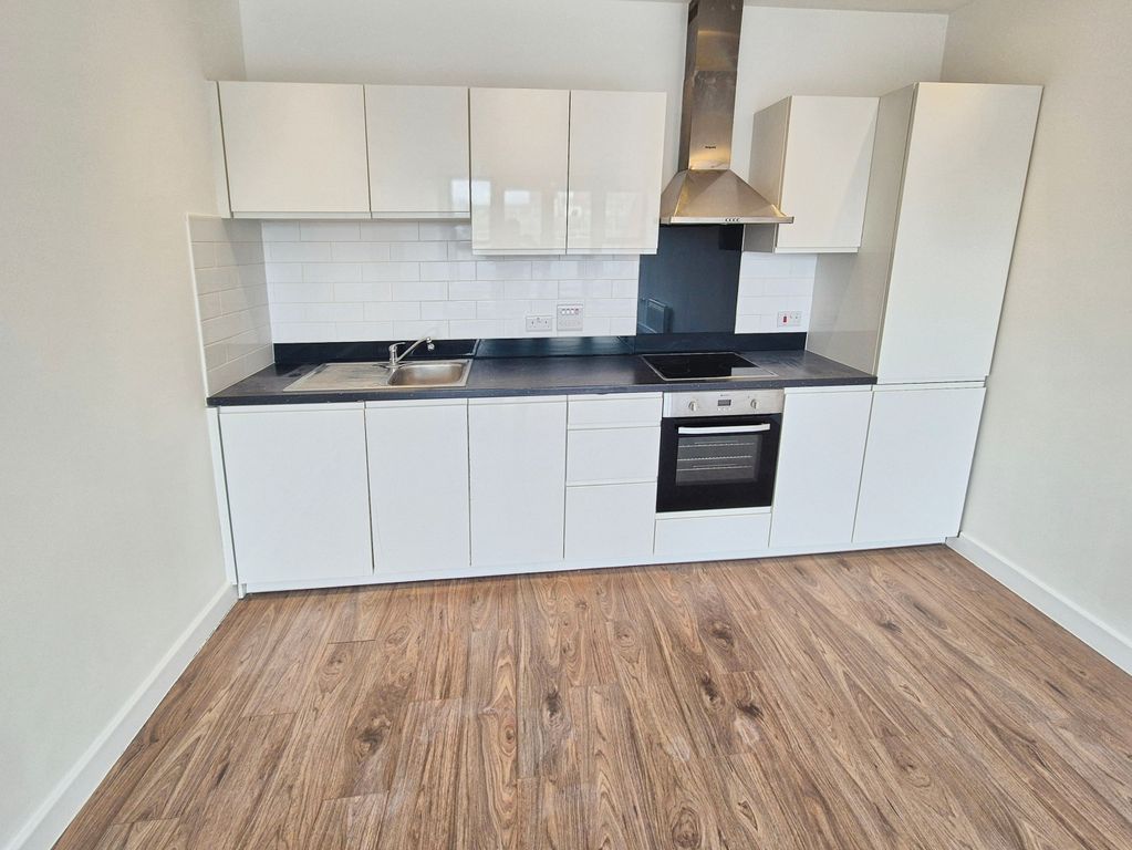 Property photo 3 of 9 Kitchen Area