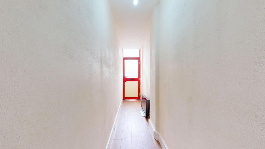 Property photo 1 of 15 Bright And Tidy Entrance With A Vibrant Red Door...