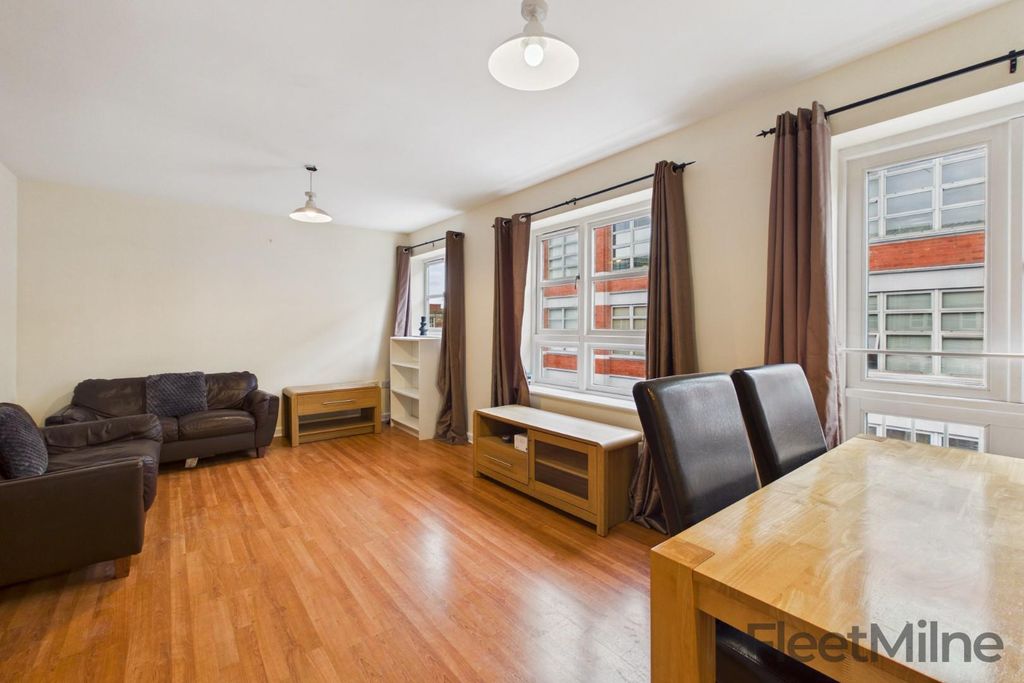 Property photo 1 of 12 Living Area