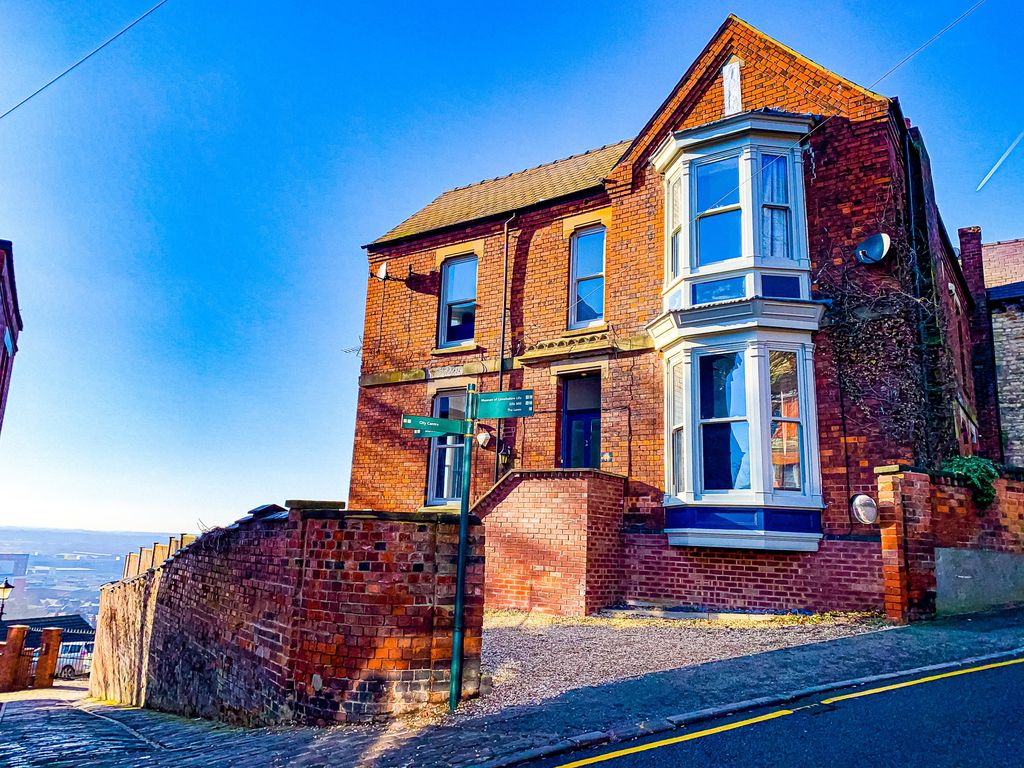 Property photo 3 of 19 Front