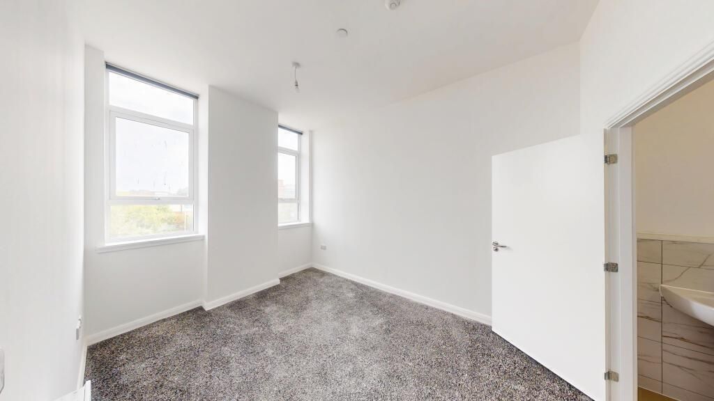 Property photo 3 of 4 Bedroom One