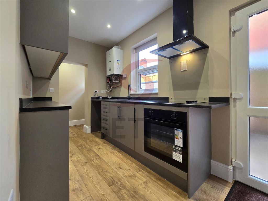 Property photo 2 of 11 Kitchen