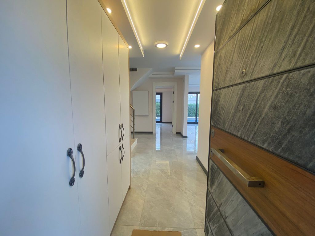 Property photo 3 of 23 Cutting Edge Detached Kusadasi Villa For Sale - Upon Entering With Storage Cabinets