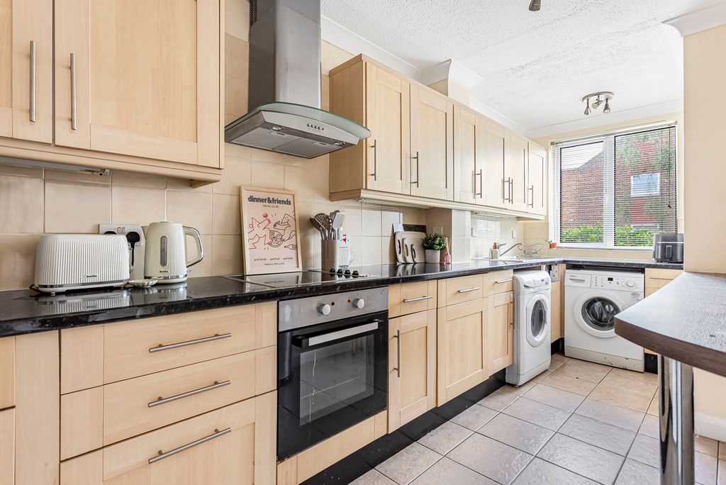 Property photo 3 of 12 Kitchen